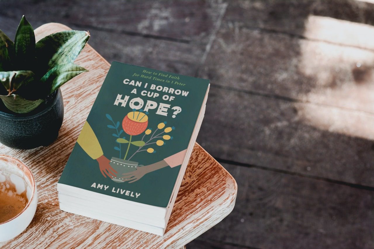 stack of books on wood table